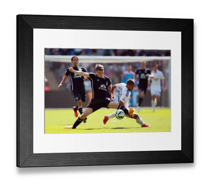 Framed Print : Clash at Liberty: Wayne Routledge vs. Seamus Coleman - Premier League Showdown Framed Print : Clash at Liberty: Wayne Routledge vs. Seamus Coleman - Premier League Showdown