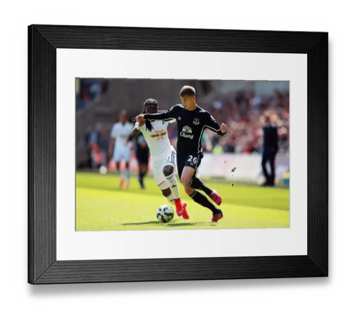 Framed Print : Clash of Titans: Emnes vs Stones at Liberty Stadium - Swansea City vs Everton Framed Print : Clash of Titans: Emnes vs Stones at Liberty Stadium - Swansea City vs Everton