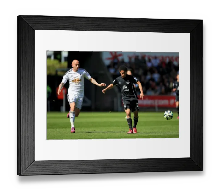 Framed Print : Intense Rivalry: Shelvey vs. Pienaar in Swansea City vs. Everton Premier League Clash Framed Print : Intense Rivalry: Shelvey vs. Pienaar in Swansea City vs. Everton Premier League Clash