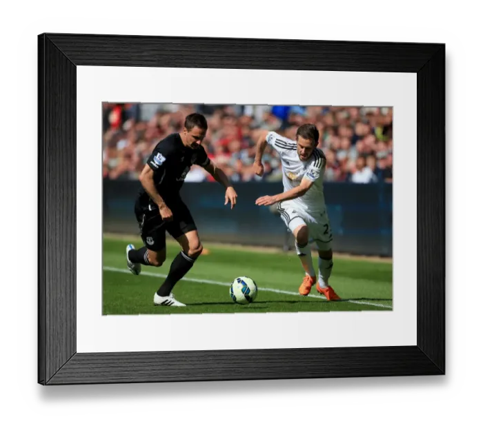 Framed Print : Intense Rivalry: Jagielka vs. Sigurdsson Battle at Swansea City vs. Everton (Barclays Premier League) Framed Print : Intense Rivalry: Jagielka vs. Sigurdsson Battle at Swansea City vs. Everton (Barclays Premier League)