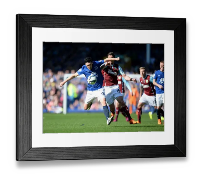 Framed Print : Intense Rivalry: Barry vs Jutkiewicz - Everton vs Burnley's Battle for Supremacy Framed Print : Intense Rivalry: Barry vs Jutkiewicz - Everton vs Burnley's Battle for Supremacy