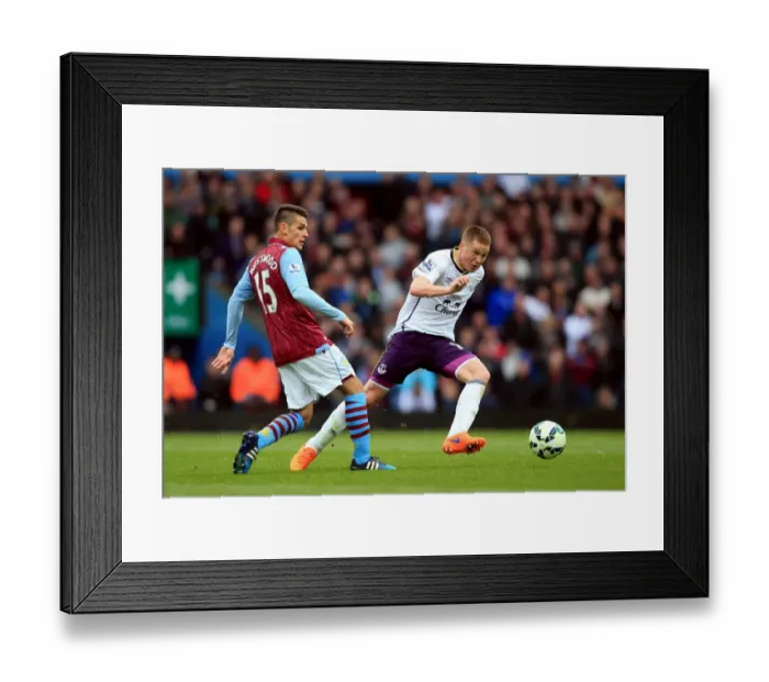 Framed Print : Intense Rivalry: McCarthy vs. Westwood's Battle for Ball Possession - Aston Villa vs. Everton, Premier League Framed Print : Intense Rivalry: McCarthy vs. Westwood's Battle for Ball Possession - Aston Villa vs. Everton, Premier League