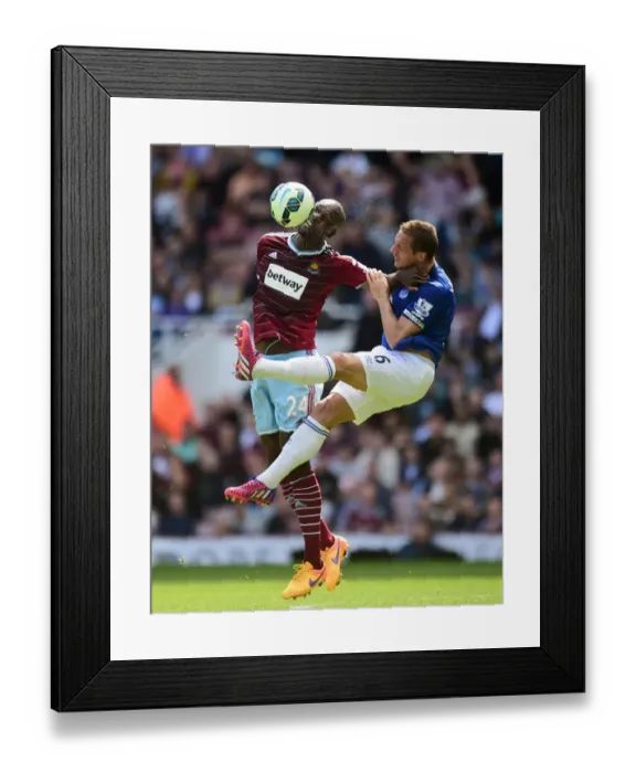 Framed Print : Intense Rivalry on the Field: Jagielka vs. Cole - West Ham United vs. Everton, Premier League