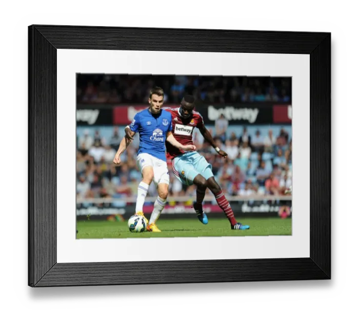Framed Print : Clash at Upton Park: Kouyate vs. Coleman - Everton vs. West Ham United Premier League Showdown Framed Print : Clash at Upton Park: Kouyate vs. Coleman - Everton vs. West Ham United Premier League Showdown
