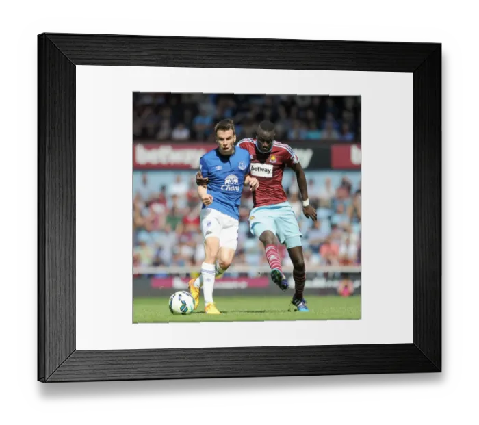 Framed Print : Clash at Upton Park: A Premier League Battle between Kouyate and Coleman - Everton vs. West Ham United Framed Print : Clash at Upton Park: A Premier League Battle between Kouyate and Coleman - Everton vs. West Ham United