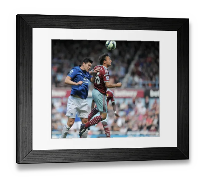 Framed Print : Noble vs. Barry: A Battle of Midfield Masters in the Barclays Premier League - West Ham United vs. Everton at Upton Park