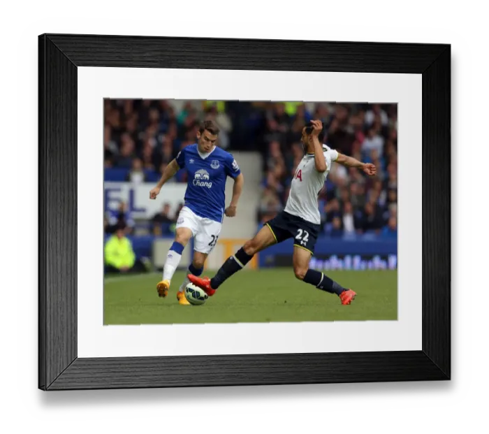 Framed Print : Battle at Goodison Park: A Clash Between Coleman and Chadli in Everton vs. Tottenham Premier League Match Framed Print : Battle at Goodison Park: A Clash Between Coleman and Chadli in Everton vs. Tottenham Premier League Match