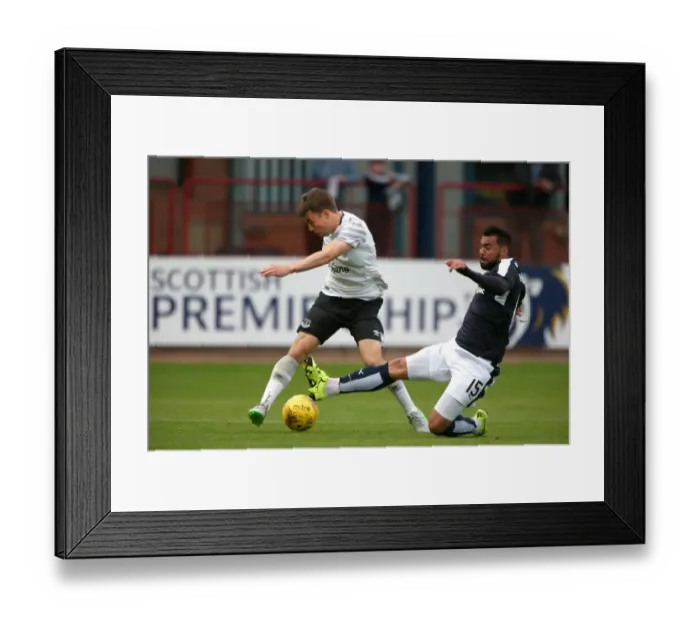Framed Print : Seamus Coleman vs Kane Hemmings: Intense Battle for the Ball in Everton's Pre-Season Clash against Dundee