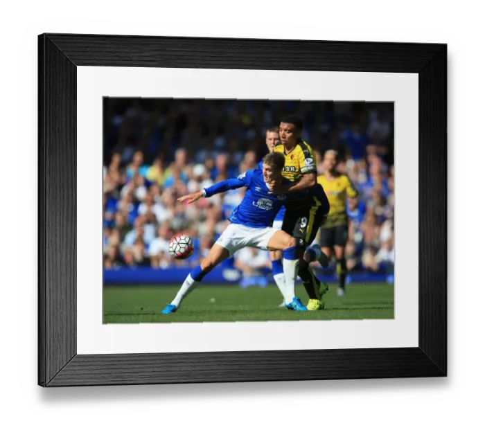 Framed Print : Battle for the Ball: John Stones vs Troy Deeney (Premier League - Everton vs Watford) Framed Print : Battle for the Ball: John Stones vs Troy Deeney (Premier League - Everton vs Watford)