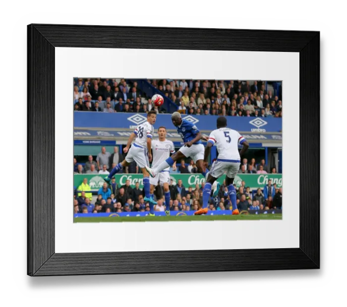 Framed Print : Arouna Kone's Determined Headed Attempt: Everton vs Chelsea, Barclays Premier League Framed Print : Arouna Kone's Determined Headed Attempt: Everton vs Chelsea, Barclays Premier League