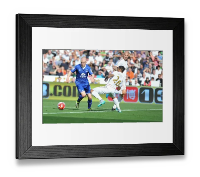 Framed Print : Intense Battle for Ball Possession: Naismith vs. Naughton - Swansea City vs. Everton, Premier League