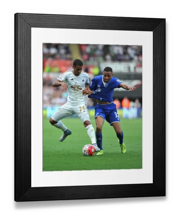 Framed Print : Naughton vs. Browning: Intense Battle in Swansea vs. Everton Premier League Clash Framed Print : Naughton vs. Browning: Intense Battle in Swansea vs. Everton Premier League Clash