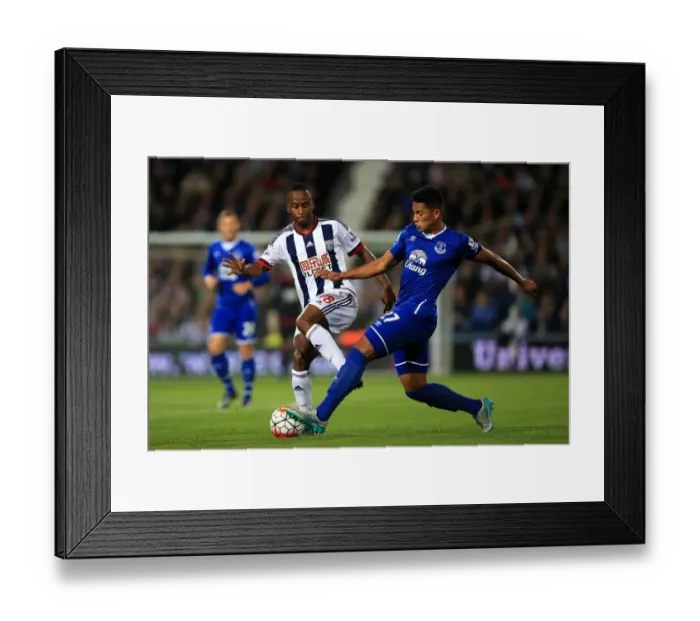 Framed Print : Battle for the Ball: Saido Berahino vs. Tyias Browning - Premier League Clash Framed Print : Battle for the Ball: Saido Berahino vs. Tyias Browning - Premier League Clash