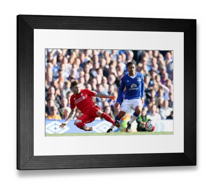 Framed Print : Intense Rivalry: Moreno vs. Lennon - Everton vs. Liverpool's Epic Battle for the Ball Framed Print : Intense Rivalry: Moreno vs. Lennon - Everton vs. Liverpool's Epic Battle for the Ball