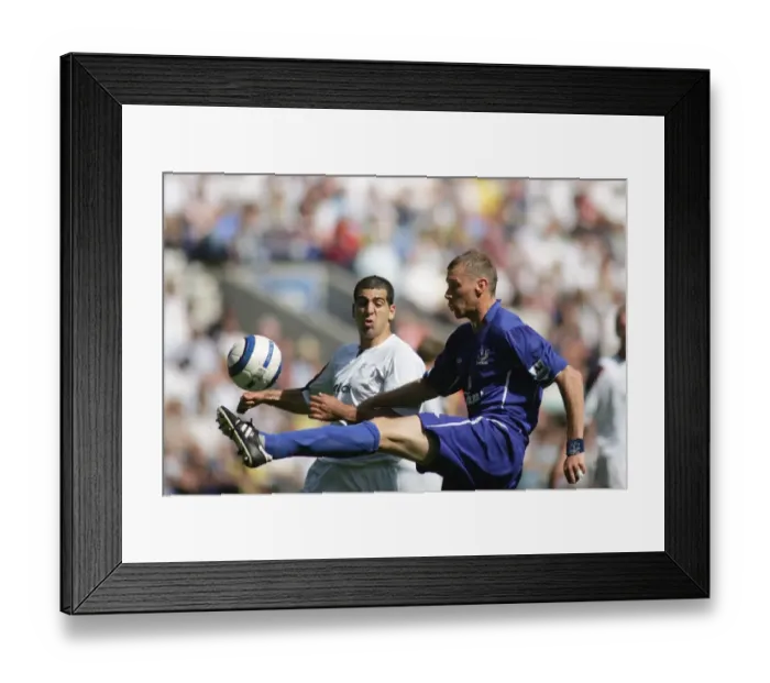 Framed Print : Duncan Ferguson's Escape Act: A Daring Volley Past Tal Ben Haim