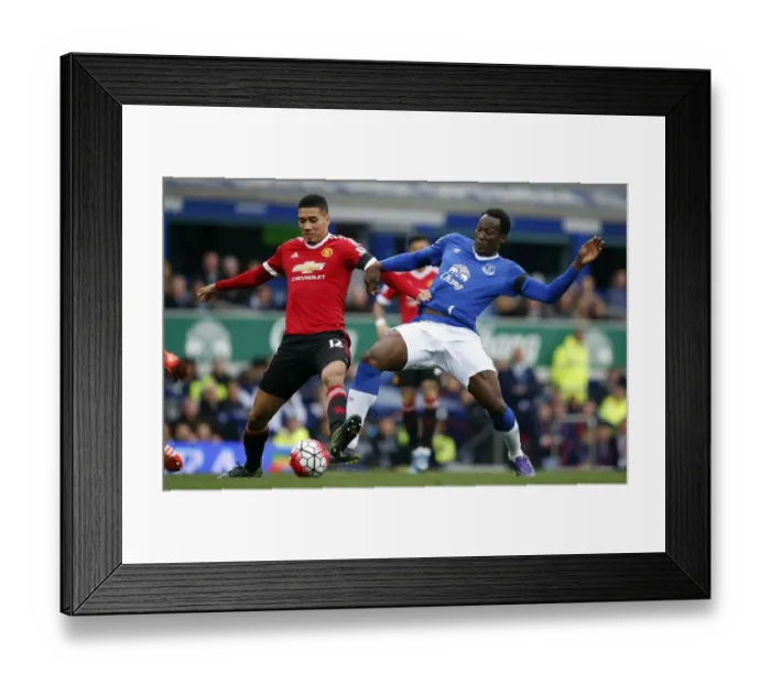 Framed Print : Lukaku vs. Smalling: Intense Battle at Goodison Park - Premier League Showdown