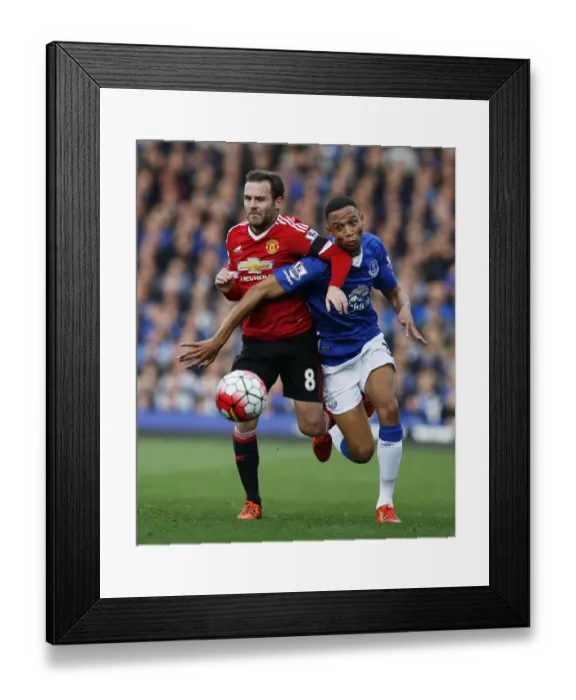 Framed Print : Intense Rivalry: Juan Mata vs Brendan Galloway - Everton vs Manchester United Battle for the Ball Framed Print : Intense Rivalry: Juan Mata vs Brendan Galloway - Everton vs Manchester United Battle for the Ball