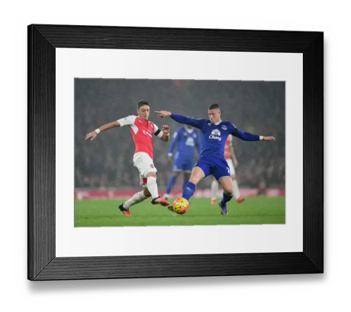 Framed Print : Battle for the Ball: Ozil vs. Barkley - Arsenal vs. Everton Framed Print : Battle for the Ball: Ozil vs. Barkley - Arsenal vs. Everton