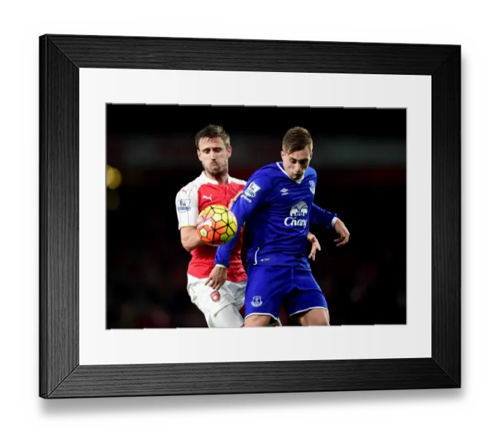 Framed Print : Monreal vs. Deulofeu: A Premier League Battle at the Emirates