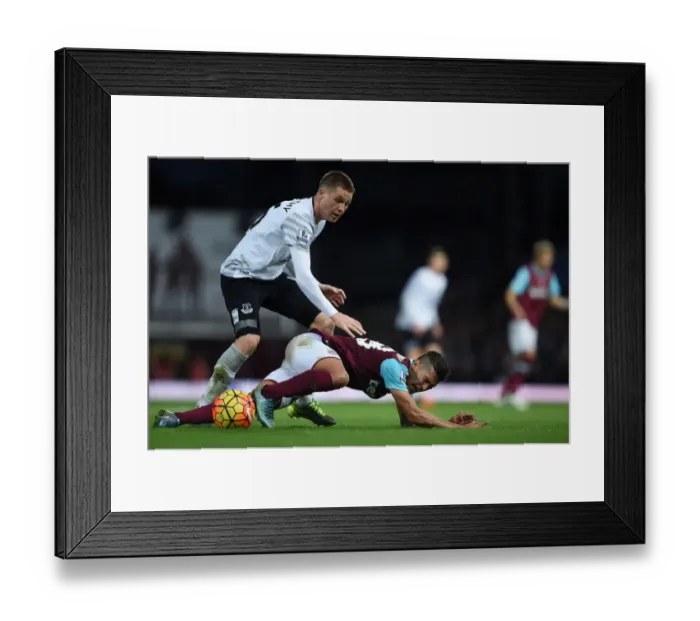 Framed Print : McCarthy vs. Lanzini: A Battle for the Ball in the West Ham United vs. Everton Premier League Clash