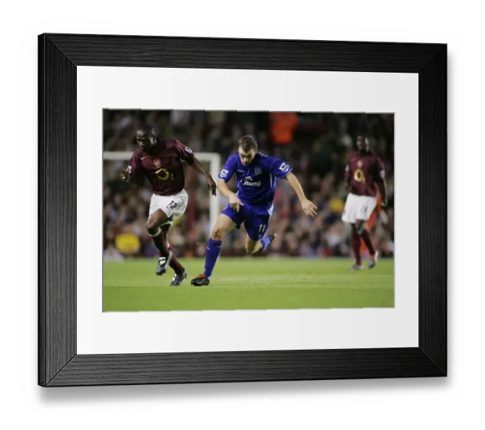 Framed Print : McFadden vs. Toure: A Football Showdown at Everton - Race for Possession