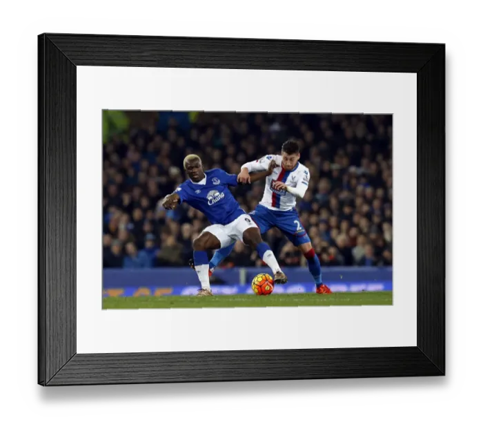 Framed Print : Battle for the Ball: Arouna Kone vs Joel Ward at Goodison Park Framed Print : Battle for the Ball: Arouna Kone vs Joel Ward at Goodison Park