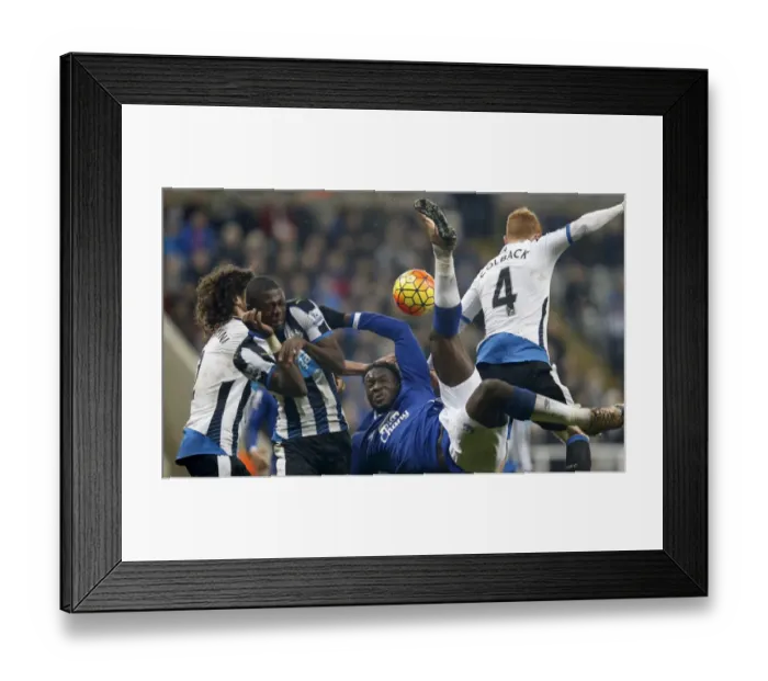 Framed Print : Lukaku's Overhead Kick Attempt vs. Newcastle United: Everton's Star Striker Takes Aim at St. James Park