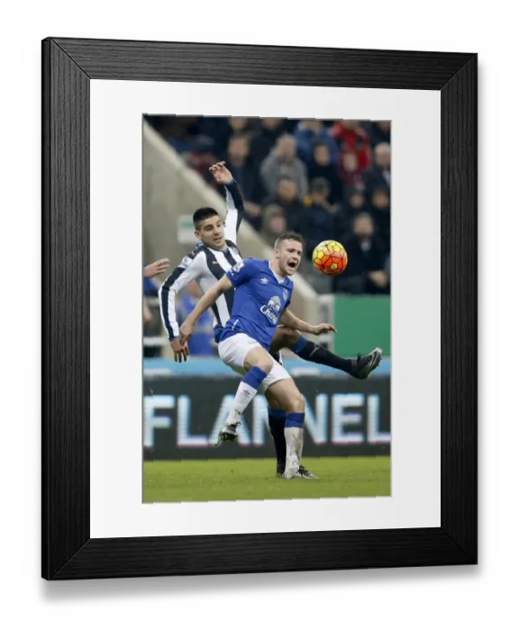 Framed Print : Mitrovic vs. Cleverley: A Battle for Supremacy - Newcastle United vs. Everton, Barclays Premier League, St. James Park Framed Print : Mitrovic vs. Cleverley: A Battle for Supremacy - Newcastle United vs. Everton, Barclays Premier League, St. James Park