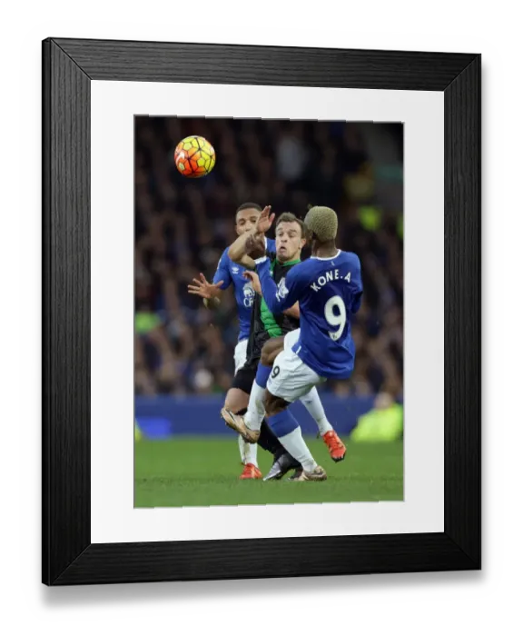 Framed Print : Intense Battle at Goodison Park: Arouna Kone vs Xherdan Shaqiri Framed Print : Intense Battle at Goodison Park: Arouna Kone vs Xherdan Shaqiri