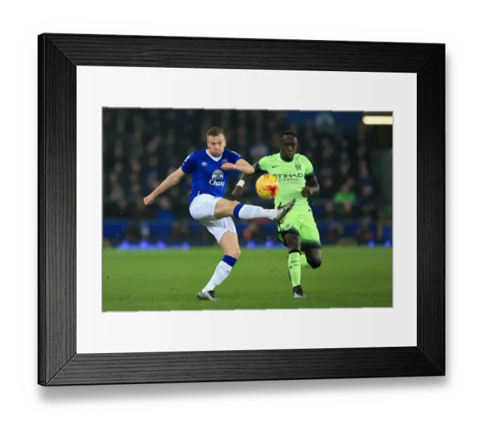 Framed Print : Everton vs Manchester City: A Fight for Possession in the Capital One Cup Semi-Final at Goodison Park Framed Print : Everton vs Manchester City: A Fight for Possession in the Capital One Cup Semi-Final at Goodison Park