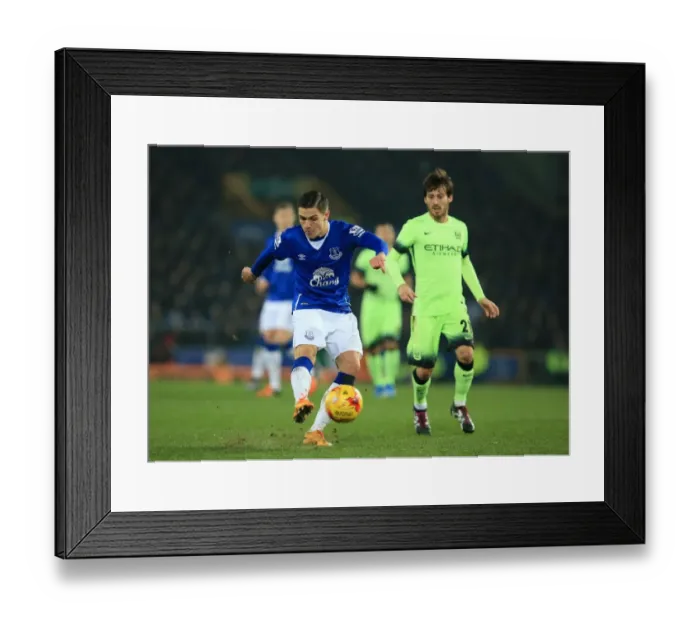 Framed Print : Muhamed Besic vs David Silva: Everton vs Manchester City - Capital One Cup Semi-Final - First Leg at Goodison Park