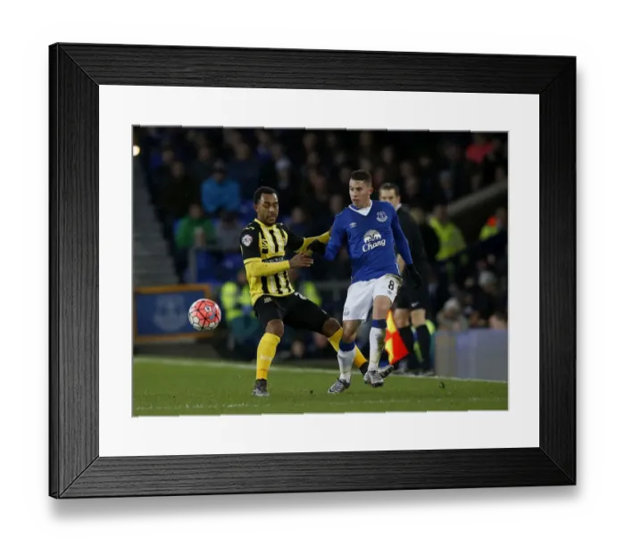 Framed Print : Everton vs Dagenham and Redbridge: A Fight for the FA Cup Ball at Goodison Park