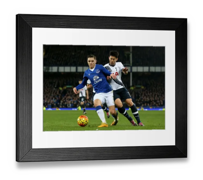 Framed Print : Battle at Goodison Park: Muhamed Besic vs. Son Heung-Min - Premier League Clash Framed Print : Battle at Goodison Park: Muhamed Besic vs. Son Heung-Min - Premier League Clash