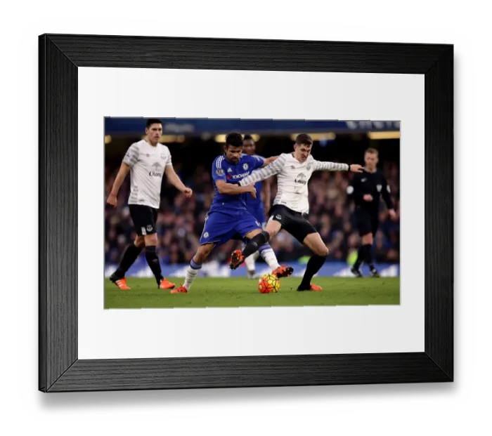 Framed Print : Battle for the Ball: Diego Costa vs. John Stones - Premier League Rivalry Framed Print : Battle for the Ball: Diego Costa vs. John Stones - Premier League Rivalry