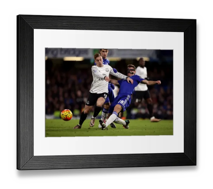 Framed Print : Battle for the Ball: Azpilicueta vs. Deulofeu - Premier League Clash between Chelsea and Everton Framed Print : Battle for the Ball: Azpilicueta vs. Deulofeu - Premier League Clash between Chelsea and Everton