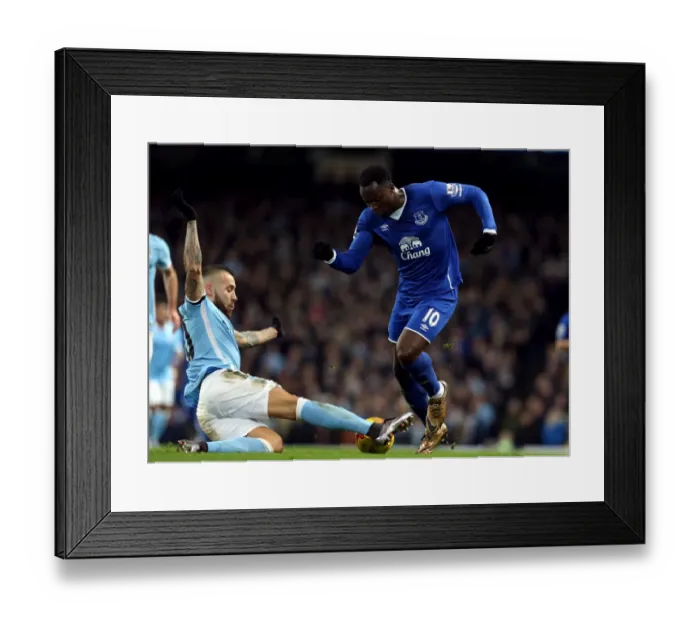 Framed Print : Lukaku vs. Otamendi: A Football Rivalry Unfolds in the Capital One Cup Semi-Final at Etihad Stadium