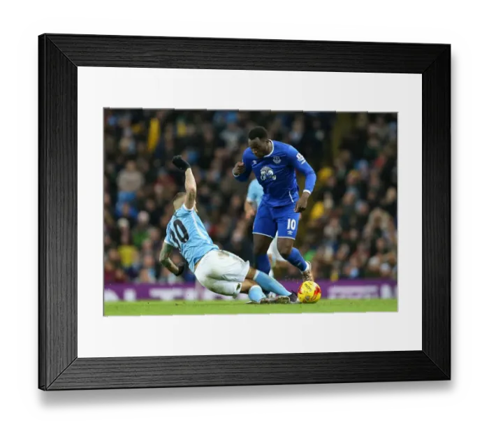 Framed Print : Otamendi vs. Lukaku: A Battle to Reach the Capital One Cup Final at Etihad Stadium