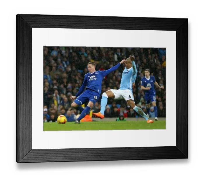 Framed Print : James McCarthy Faces Pressure from Fernando: Everton's Tense Shot in Capital One Cup Semi-Final at Etihad Stadium Framed Print : James McCarthy Faces Pressure from Fernando: Everton's Tense Shot in Capital One Cup Semi-Final at Etihad Stadium