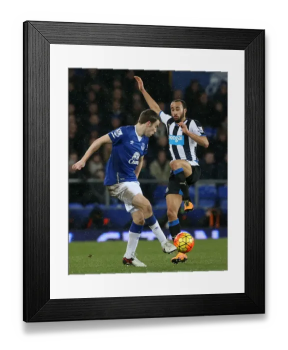 Framed Print : Battle at Goodison Park: Andros Townsend vs. Seamus Coleman - Intense Rivalry in Everton vs. Newcastle United, Premier League Clash Framed Print : Battle at Goodison Park: Andros Townsend vs. Seamus Coleman - Intense Rivalry in Everton vs. Newcastle United, Premier League Clash