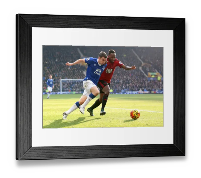 Framed Print : A Battle for the Ball: Seamus Coleman vs. Saido Berahino - Everton vs. West Bromwich Albion Framed Print : A Battle for the Ball: Seamus Coleman vs. Saido Berahino - Everton vs. West Bromwich Albion