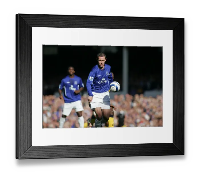 Framed Print : David Weir: Guarding Everton's Turf - Shielding the Ball from Wigan's Advance Framed Print : David Weir: Guarding Everton's Turf - Shielding the Ball from Wigan's Advance