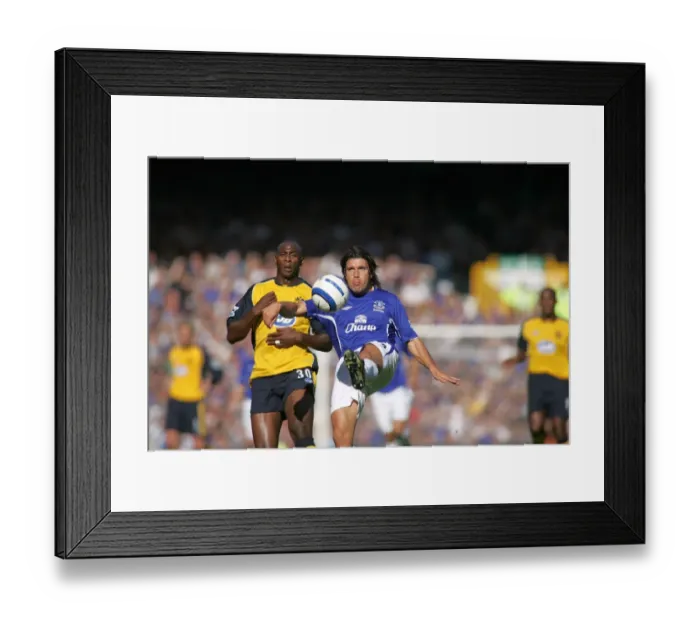 Framed Print : Valente vs Roberts: The Defiant Moment of Football Courage Framed Print : Valente vs Roberts: The Defiant Moment of Football Courage
