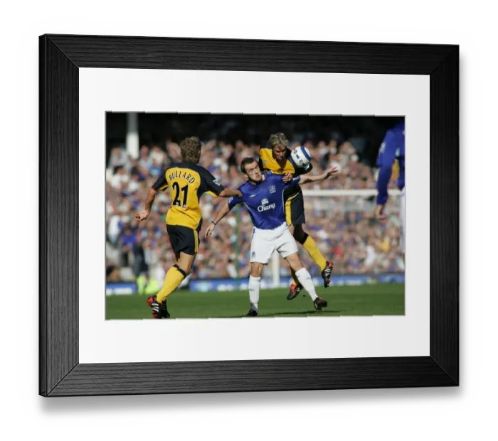 Framed Print : Tenacious James McFadden Battles Two Wigan Defenders Framed Print : Tenacious James McFadden Battles Two Wigan Defenders