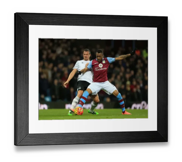 Framed Print : Intense Battle for Ball Possession: Jagielka vs. Ayew, Aston Villa vs. Everton, Premier League Framed Print : Intense Battle for Ball Possession: Jagielka vs. Ayew, Aston Villa vs. Everton, Premier League