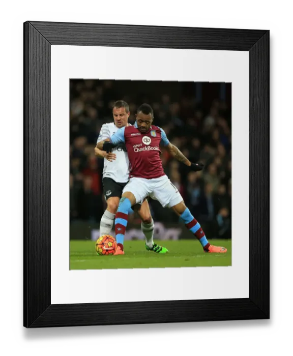 Framed Print : Intense Rivalry: Ayew vs. Jagielka - Aston Villa vs. Everton's Epic Battle for Supremacy