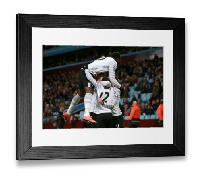 Framed Print : Everton's Aaron Lennon Celebrates Second Goal Amidst Ecstatic Team Mates in Intense Aston Villa vs Everton Barclays Premier League Clash Framed Print : Everton's Aaron Lennon Celebrates Second Goal Amidst Ecstatic Team Mates in Intense Aston Villa vs Everton Barclays Premier League Clash