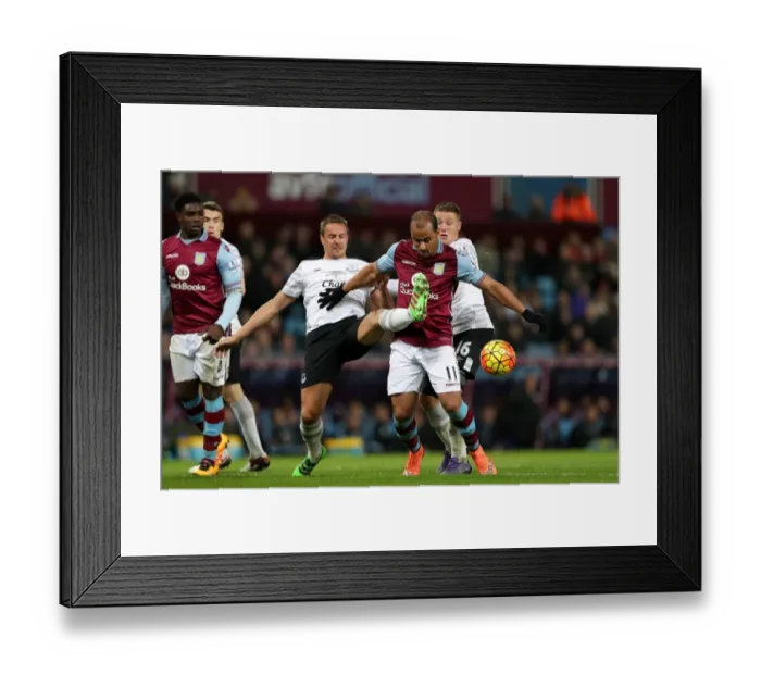 Framed Print : Intense Rivalry: Jagielka vs Agbonlahor's Battle for Ball Supremacy - Aston Villa vs Everton, Premier League Framed Print : Intense Rivalry: Jagielka vs Agbonlahor's Battle for Ball Supremacy - Aston Villa vs Everton, Premier League