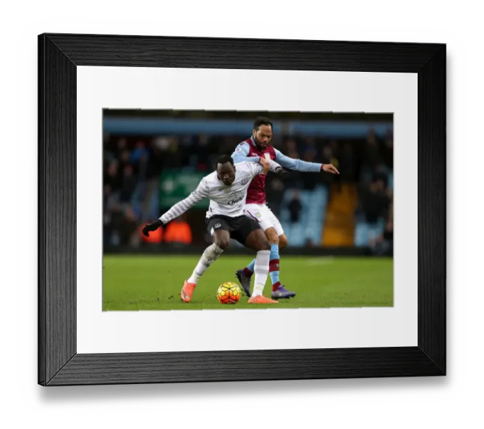 Framed Print : Intense Rivalry: Lukaku vs. Lescott's Battle for Ball Possession - Aston Villa vs. Everton, Premier League Framed Print : Intense Rivalry: Lukaku vs. Lescott's Battle for Ball Possession - Aston Villa vs. Everton, Premier League