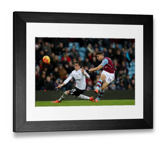 Framed Print : Intense Rivalry: Gestede vs. Funes Mori Clash at Villa Park - Everton vs. Aston Villa, Premier League Framed Print : Intense Rivalry: Gestede vs. Funes Mori Clash at Villa Park - Everton vs. Aston Villa, Premier League