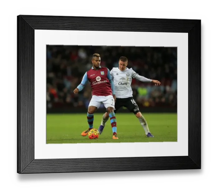 Framed Print : Battle for Supremacy: McCarthy vs. Bacuna in the Barclays Premier League Clash between Aston Villa and Everton at Villa Park Framed Print : Battle for Supremacy: McCarthy vs. Bacuna in the Barclays Premier League Clash between Aston Villa and Everton at Villa Park